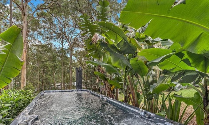 Murrays Beach Maison | Wallarah Forest Stay - heated swim spa and resort style grounds