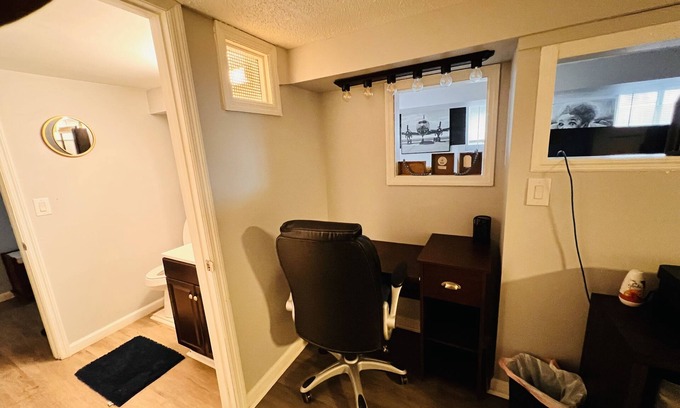 Troy Maison | Warm and cozy basement.