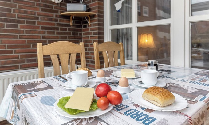 Carolinensiel Appartement | Chaleureux et avec quelques extras: Dans l'appartement du rez-de-chaussée avec ses env.
