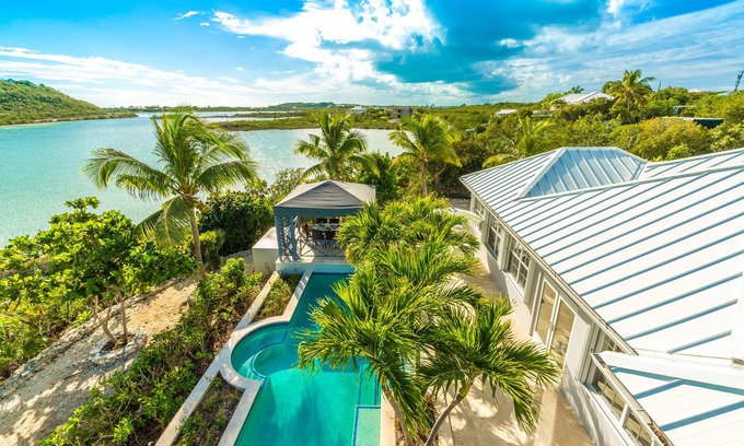 Venetian Road Settlement Villa | Water front, with amazing elevated views, pool, flamingoes, private and quiet
