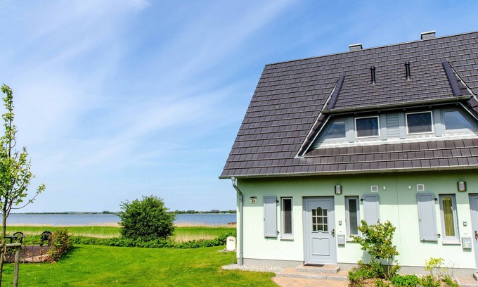 Neuenkirchen Maison | Vues de l'eau, 1 Un emplacement avec vue sur l'eau et du port, sauna, cheminée, sans fil