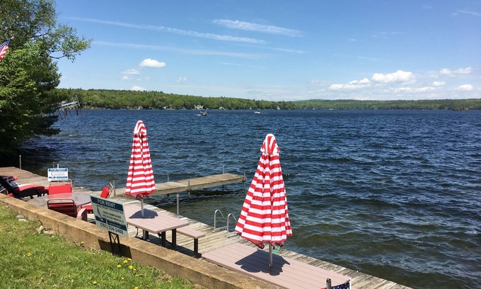 Laconia Maison | WATERFRONT HOME MILLION DOLLAR VIEWS BOAT HOUSE & BOAT SLIPS SITS ONTOP OF WATER