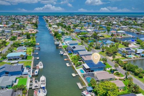 Spring Hill Maison | Waterfront home with pool and gameroom!