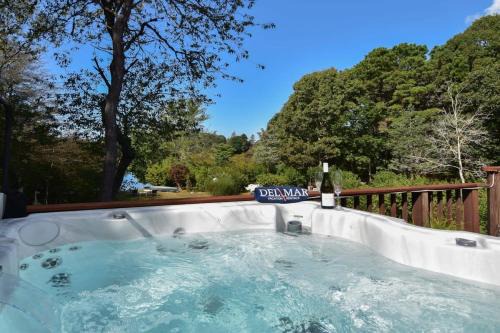 Eastham Maison | Waterfront home with Hot Tub Firepit and Game Room