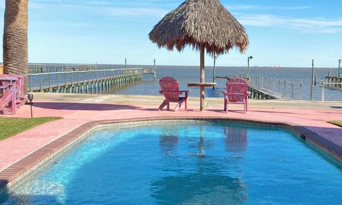 Dickinson Maison | Waterfront Oasis with private pool, Hot tub and 200 ft. Lighted fishing pier