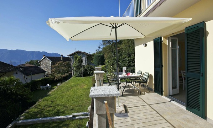 Gonte Appartement | Appartement de 3½ pièces bien entretenu avec jardin, balcon et belle vue sur le lac