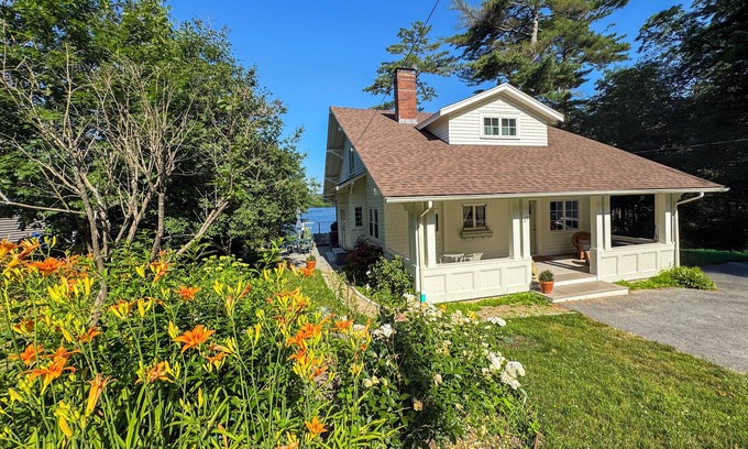 Prides Crossing Cottage | NEW -Lakefront 2 Bed / 3 bath + Extra Bed off of living room