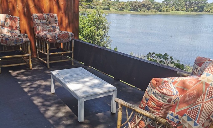 Opunake Cottage | With the lake on your doorstep, BEACH 2 minutes away and river swimming hole .