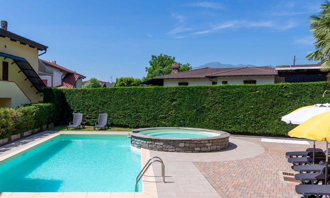 Sorico Maison | Maison de vacances privée avec WIFI, piscine, climatisation, TV, terrasse, animaux admis, parking