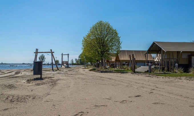 Biddinghuizen Maison | Belle maison de vacances privée pour 4 personnes avec WIFI, piscine, TV et terrasse