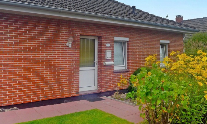 Norddeich Maison | Agréable appartement pour 5 personnes avec WIFI, TV, animaux admis et parking