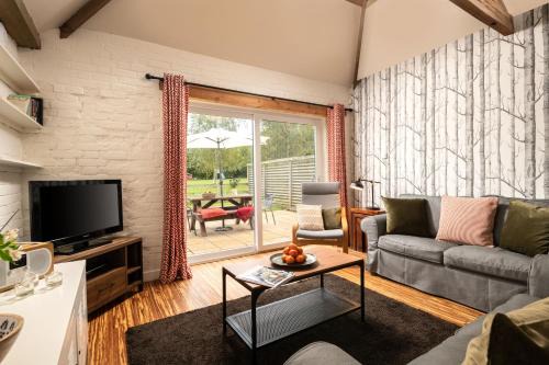 Sculthorpe Maison | Woodpecker