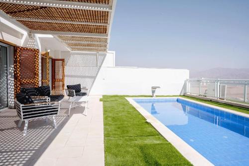 Eilat Appartement | YalaRent Suff mountains- Garden apartment with private pool