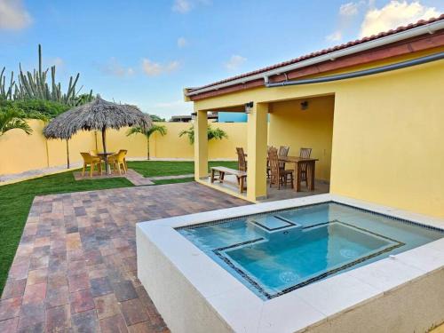 Calbas Plaza Residences Maison | Yellow Cunucu-4 Bedrooms House