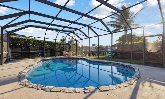 Venetian Way Maison | Your Ultimate Coastal Retreat! Stunning 4-Bed Canal-Front Home w/Pool & Lanai