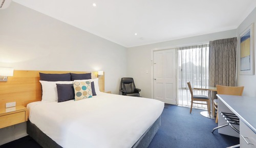 Chambre Deluxe, 1 grand lit, baignoire à jets