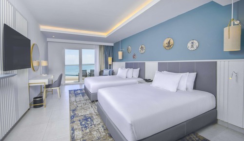 Chambre Deluxe, 2 lits doubles, vue partielle sur la mer