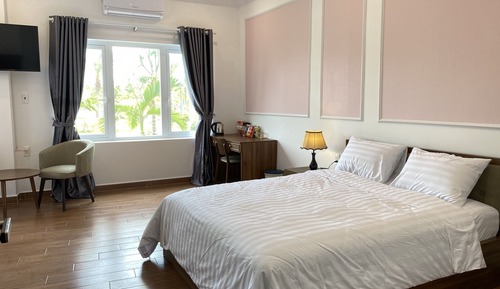Chambre Deluxe, vue jardin (Family)