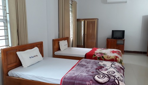 Chambre Deluxe Double ou avec lits jumeaux