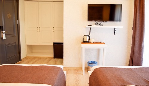 Chambre Standard avec lits jumeaux, plusieurs lits, vue cour intérieure