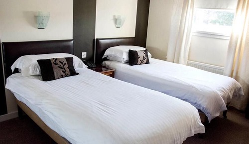 Chambre Exécutive avec lits jumeaux