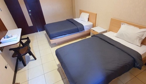 Chambre avec lits jumeaux