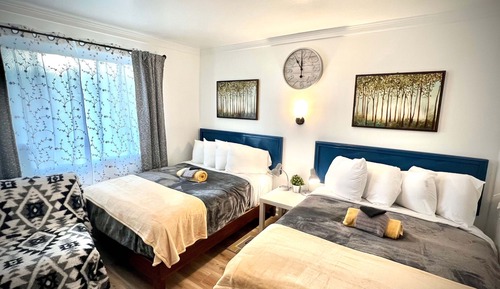 Chambre Design, 2 lits doubles, non-fumeurs, réfrigérateur et four à micro-ondes