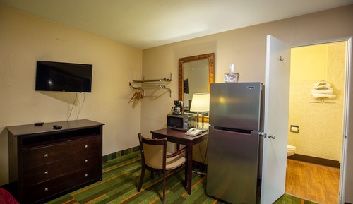 Chambre Simple Deluxe, 1 grand lit, non-fumeurs, réfrigérateur et four à micro-ondes