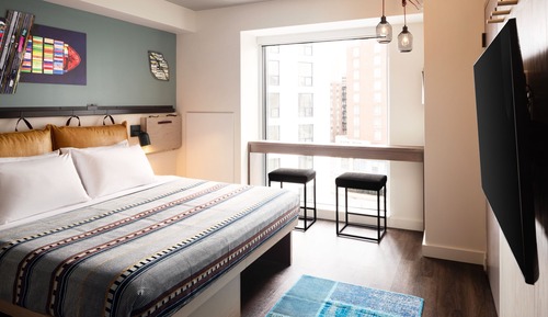 Studio, 1 très grand lit, coin cuisine