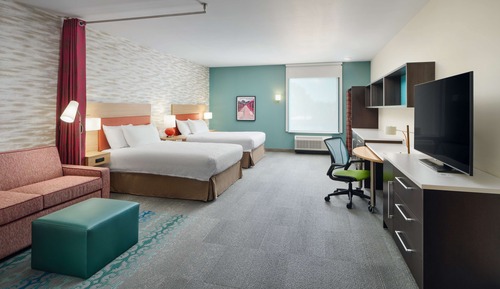 Suite Studio, 2 grands lits, accessible aux personnes à mobilité réduite, baignoire