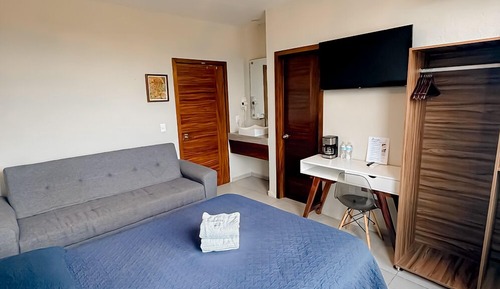 Chambre Standard, 1 grand lit et 1 canapé-lit, vue colline