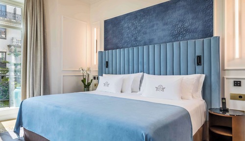 Chambre Deluxe, en angle (1A-1C)