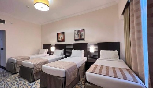 Chambre Quadruple Deluxe