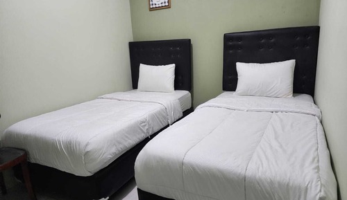 Chambre Deluxe, 2 lits une place