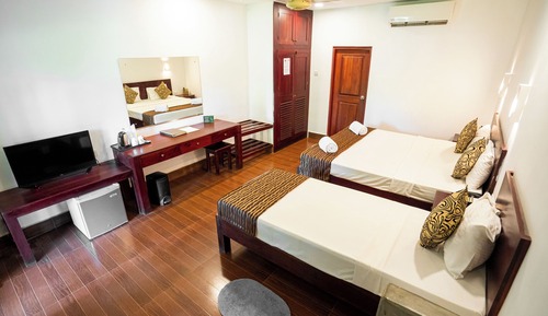 Chambre Triple Deluxe, vue établissement