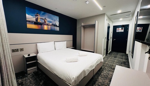 Chambre Deluxe Double ou avec lits jumeaux, accessible aux personnes à mobilité réduite