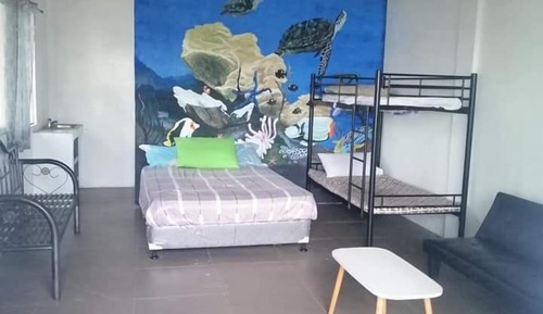 Chambre Quadruple Familiale, vue océan, en bord de plage