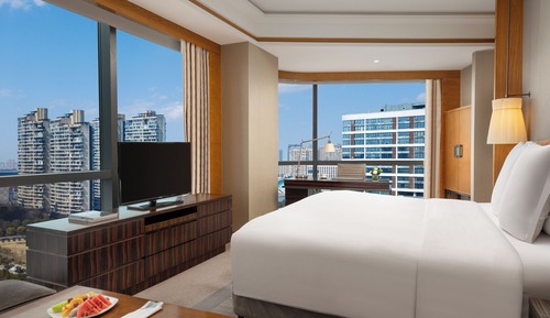 Chambre Deluxe, 1 très grand lit, en angle