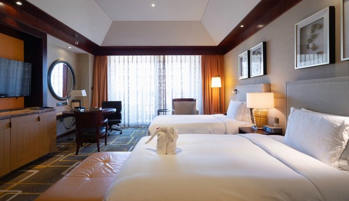 Chambre Exécutive avec lits jumeaux, accès salon affaires, vue océan
