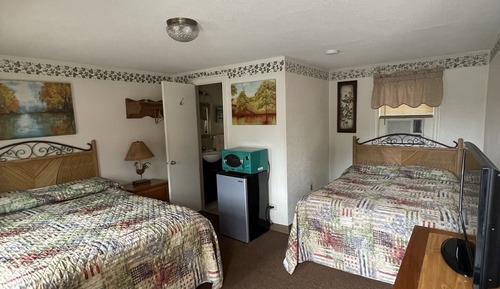 Chambre Double (1 Queen & 1 Double)