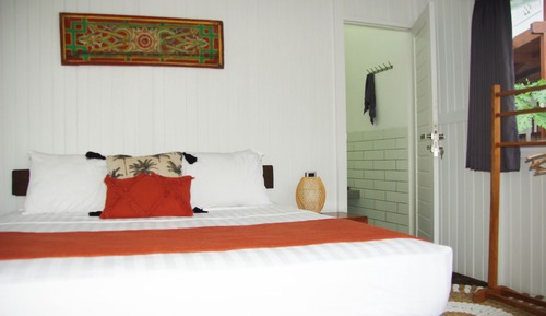 Chambre Deluxe, vue partielle sur l'océan