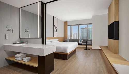 Chambre Deluxe, 1 très grand lit, vue ville, en angle