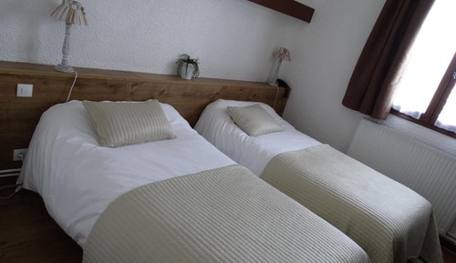 Chambre avec lits jumeaux