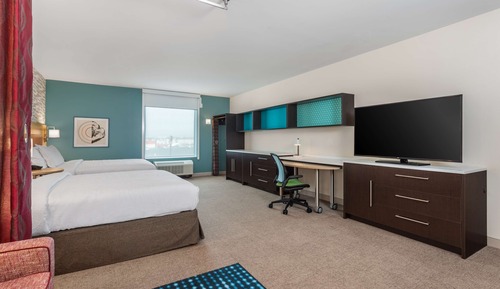 Suite Studio, 2 grands lits, accessible aux personnes à mobilité réduite, baignoire