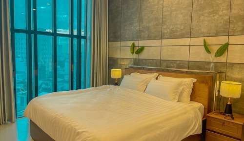 Chambre Deluxe, 1 très grand lit