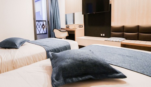 Chambre Standard, 2 lits une place, non-fumeurs, vue ville