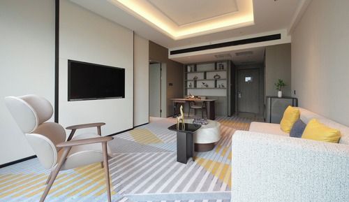 Suite, 1 très grand lit, accès au salon club (Living Area)