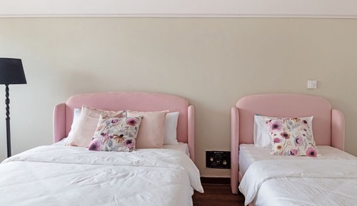 Chambre Deluxe avec lits jumeaux, plusieurs lits
