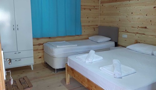 Bungalow, plusieurs lits, vue jardin