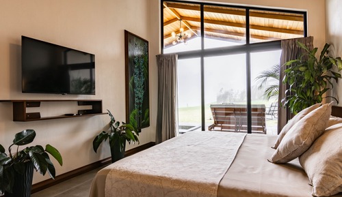 Villa Lune de Miel, 1 très grand lit et 1 canapé-lit